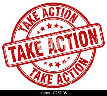 take action red grunge round vintage rubber stamp Stock Photo