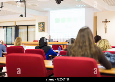Students listening to the lecture. Stock Photo