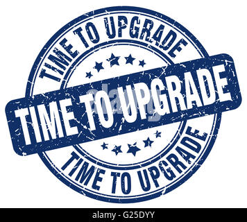 time to upgrade blue grunge round vintage rubber stamp Stock Photo