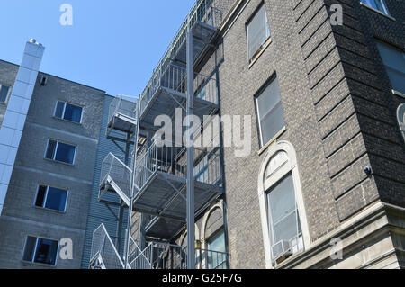Fire escape stairs on old hospital building Stock Photo