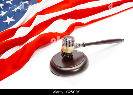 Wooden judge gavel near flag of Unites States of America Stock Photo