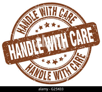 handle with care brown grunge round vintage rubber stamp Stock Photo ...