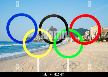 RIO DE JANEIRO - MARCH 15, 2016: Olympic rings stand on Ipanema Beach in anticipation of the city hosting the Summer Games. Stock Photo