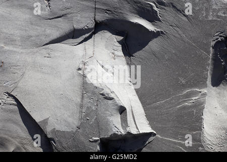 Gray uneven stone texture background in direct sunlight Stock Photo