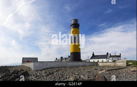 St John's Point lighthouse at Killough County Down Northern Ireland withe the Mourne mountains in the background Stock Photo