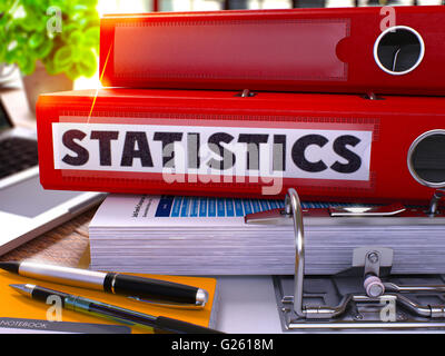 Statistics on Red Office Folder. Toned Image. Stock Photo