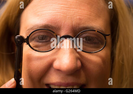 Voyager Press, London UK. 24th May 2016. Rare collection of Spectacles from the 1700s to the 1940s is previewed and modelled before going to the London Antiquarian Book Fair at Olympia. Credit:  Malcolm Park editorial/Alamy Live News. Stock Photo