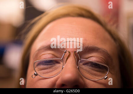 Voyager Press, London UK. 24th May 2016. Rare collection of Spectacles from the 1700s to the 1940s is previewed and modelled before going to the London Antiquarian Book Fair at Olympia. Credit:  Malcolm Park editorial/Alamy Live News. Stock Photo