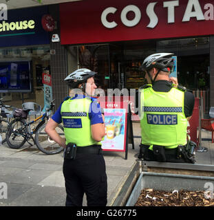 Portsmouth, Hampshire, UK. 24th May, 2016. A couple this afternoon are recovering after a shop front in the busy Commercial Road in Portsmouth fell and knocked them to the ground outside the Costa Coffee. The middle-aged couple needed hospital treatment after a large piece of shop front fell to the ground and knocked them out.  One eye-witness, said, 'It was shocking. I was sat nearby when I saw the wood fall from the top and the couple collapsed  in a heap in the ground. Credit:  uknip/Alamy Live News Stock Photo