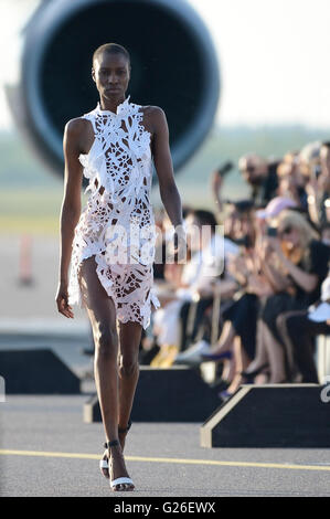 Helsinki, Finland. 24th May, 2016. Models presented collection of Bora Aksu, a London based Turkish fashion designer, during the Ultimate Runway Fashion Show at Helsinki Airport, Finland, on May 24, 2016. A unique fashion show was held on Tuesday night at the Runway 2 of Helsinki Airport, which was transformed into a catwalk and enabled seven designers from China, Korea, Japan, the UK, Sweden, Denmark and Finland to present their collections. © Sergei Stepanov/Xinhua/Alamy Live News Stock Photo