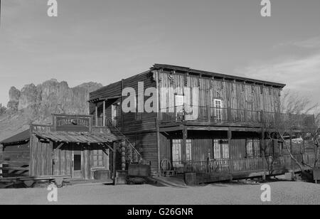 Cowboy Town - Old Wild West Cowboy town with mountains in background Stock Photo