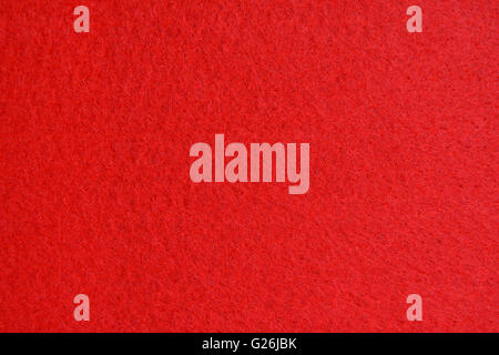 Red felt background. Stock Photo