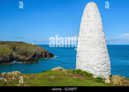 Entrance to Porthgain Harbour, marked by two large white columns, on the Pembrokeshire Coast, West Wales Stock Photo