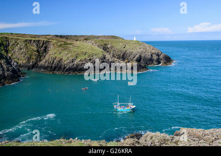 Entrance to Porthgain Harbour on the Pembrokeshire Coast National Park West Wales on a sunny day Stock Photo