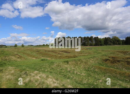 Remains of ditches and ramparts and access road to Ardoch Roman Fort near Braco Scotland  May 2016 Stock Photo