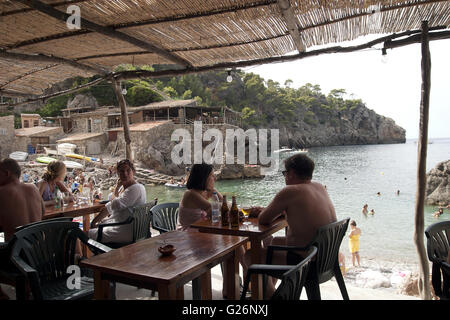 a beautiful view of tourists in a cafe on the beach front, Palma de Mallorca, Palma di Maiorca, summer, tourism, relax, holidays Stock Photo