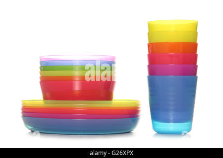 stack of colourful plastic cups bowls and plates cutout Stock Photo