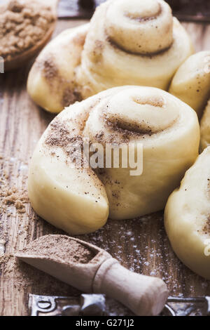Making . Homemade raw yeast dough after raising ready to bake, rustic style Stock Photo