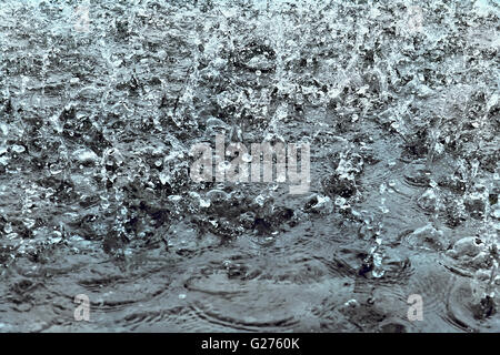 raindrops on water as background Stock Photo