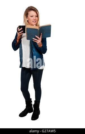 Beautiful woman reading a book while drinking a hot beverage Stock Photo