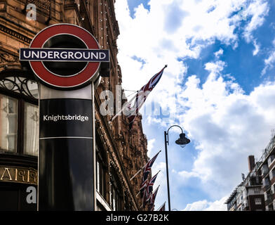 London Knightsbridge underground metro train tube station sign in from of Harrods Stock Photo