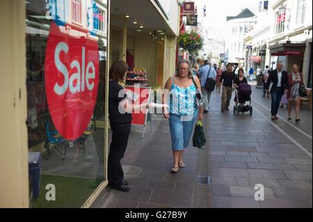 Sale signs showing how much the high street is struggling to make customers visit their stores and move away from purchasing online Stock Photo