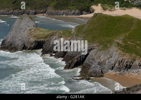 Looking down on the surf and cliffs of two Gower beaches,Wales, UK Stock Photo