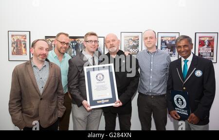 EDITORIAL USE ONLY Past and present editors of Doctor Who Magazine (left to right) Alan Barnes, Gary Gillatt, Tom Spilsbury, Dez Skinn, Marcus Hearn accept the Guinness World Record for The WorldÂ’s Longest Running TV-Tie in Magazine from Guinness World Records adjudicator Pravin Patel at a party to celebrate the 500th issue of the Doctor Who Magazine at White Space in London. Stock Photo
