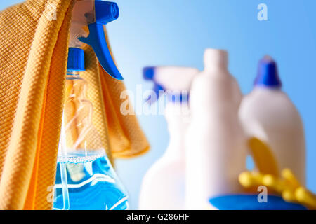 Professional cleaning equipment on white table and blue background. Cleaning tools company concept. Front view. Horizontal Stock Photo