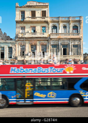 A Havana tour bus travelling along the Malecón in Havana La Habana, Cuba with slow shutter speed for motion blur. Stock Photo