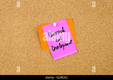 Research and Development written on paper note pinned on cork board with white thumbtack, copy space available Stock Photo