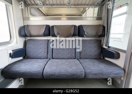 Three adjacent empty seats on modern European train Stock Photo