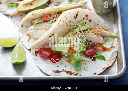 Chicken tacos with salad and tomatoes Stock Photo