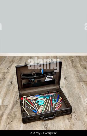 A studio photo of an old leather briefcase Stock Photo