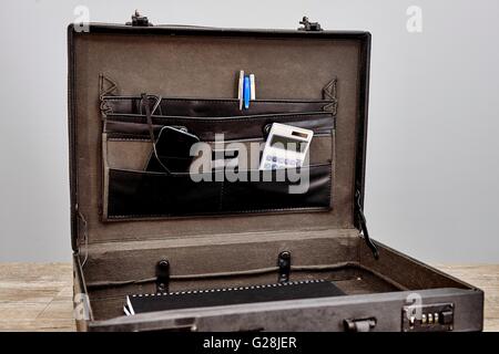 A studio photo of an old leather briefcase Stock Photo