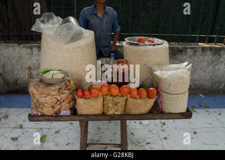 Street Food-Puffed rice with Indian chaat (snack). Stock Photo