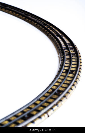 Small section of toy rail track, with a curve. Stock Photo