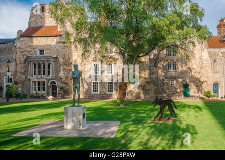 Bury St Edmunds abbey, view of the Cathedral Close in Bury St Edmunds with statue of St Edmund by Dame Elisabeth Frink, UK Stock Photo