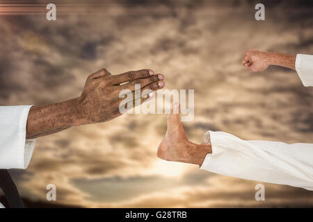 Composite image of close up view oh hands Stock Photo