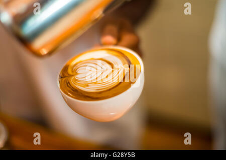 How to make latte art coffee, heart symbol Stock Photo