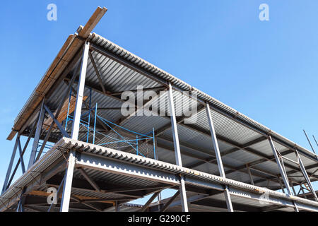 Modern industrial building is under construction. Exterior fragment Stock Photo