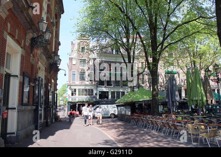 Terraces and tourists at Leidseplein square in Amsterdam, Netherlands. Stock Photo