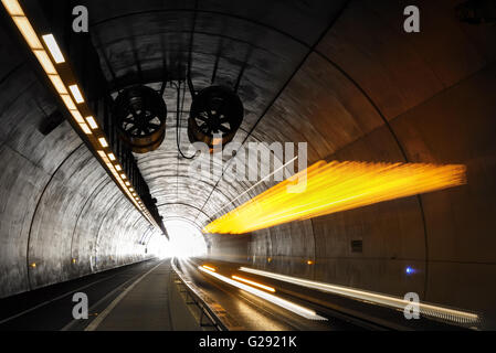 Bus driving in Tunnel de la Croix-Rousse, a new tunnel for public transports, cyclist and pedestrians in Lyon, France. Stock Photo