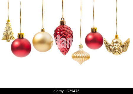Hanging Christmas globes or various decorations isolated on white background Stock Photo