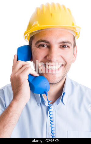 Construction company contact us concept with engineer talking on the phone Stock Photo