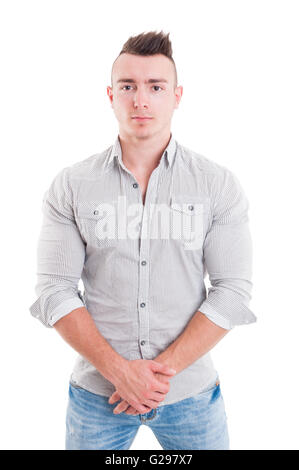 Strong male model posing on white background wearing casual clothes like jeans and shirt Stock Photo