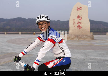 May 22, 2016 - Mohe, Mohe, CHN - Mohe, China - May 22 2016: (EDITORIAL USE ONLY. CHINA OUT) Kong Lingxu went back home on May 22 finally. He went acrossed 2100 kilometers in 22 days, 20 cities in LIaoning, Jilin, Neimeng, Heilongjiang. And he arrived North Pole Village in Mohe. He used to be an assistant engineer and found it so boring. So he quitted and started a journey by bicycle. He even biked 170 kilometers for one day, exhausted, without water and food. The most difficult thing was the mosquitoes. He seldom went to restaurants, just had some breads instead. (Credit Image: © SIPA Asia via Stock Photo