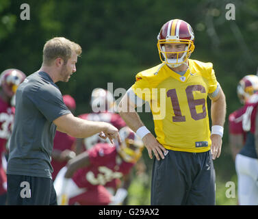 Washington Redskins quarterback Colt McCoy (12) tosses a pass during the  first day of NFL football training camp in Richmond, Va., Thursday, July  25, 2019. (AP Photo/Steve Helber Stock Photo - Alamy