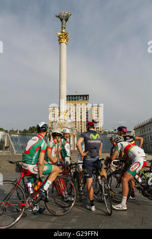 May 26, 2016 - Cyclists of Belarus national team, who came to Ukraine participate the international RACE HORIZON PARK competition on Kyiv Day, May 28, sightsee the monument of Independence at Maidan(Independence Square), May 26, 2016. (Credit Image: © Sergii Kharchenko via ZUMA Wire) Stock Photo