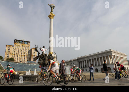 May 26, 2016 - Cyclists of Belarus national team, who came to Ukraine participate the international RACE HORIZON PARK competition on Kyiv Day, May 28, sightsee the monument of Independence at Maidan(Independence Square), May 26, 2016. (Credit Image: © Sergii Kharchenko via ZUMA Wire) Stock Photo